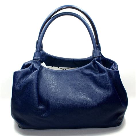 navy blue leather shoulder bag.